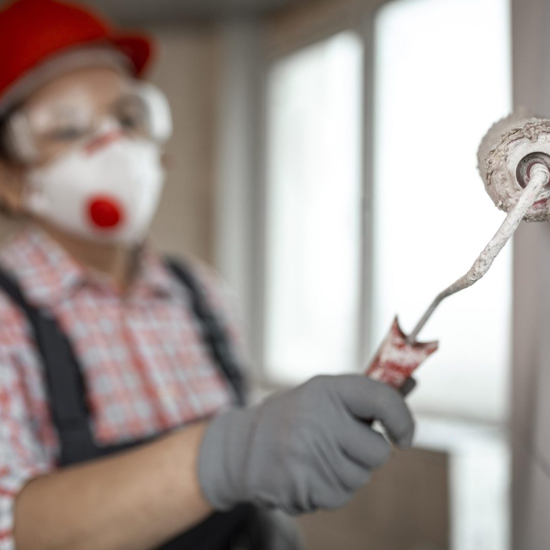 construction-worker-with-helmet-paint-roller